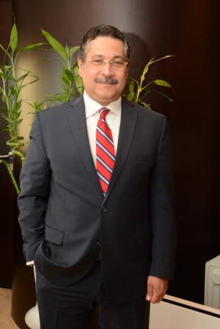 حسن غانم- رئيس مجلس إدارة بنك التعمير والإسكان