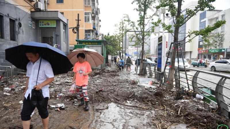مصرع 11 شخصا و27 مفقودا جراء فيضانات في بكين