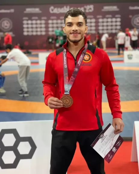 رئيس جامعة مدينة السادات تهنئ بطل المصارعة الحرة الفائز ببرونزية أفريقيا والمقامة بالمغرب