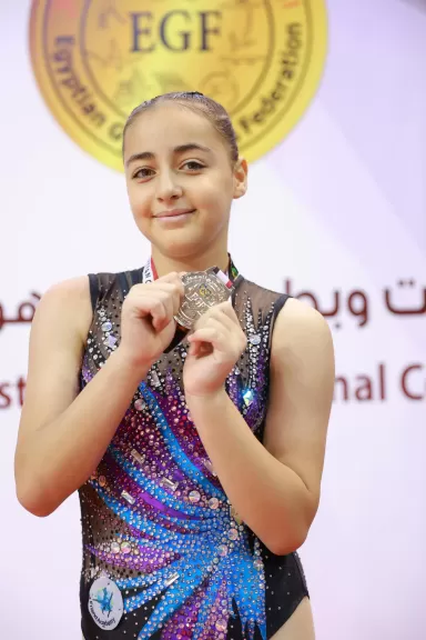 ”لارا أبو سريع” تحصد المركز الثاني علي مستوى الجمهورية في الجمباز الأيروبك وتفوز بالميدالية الفضية