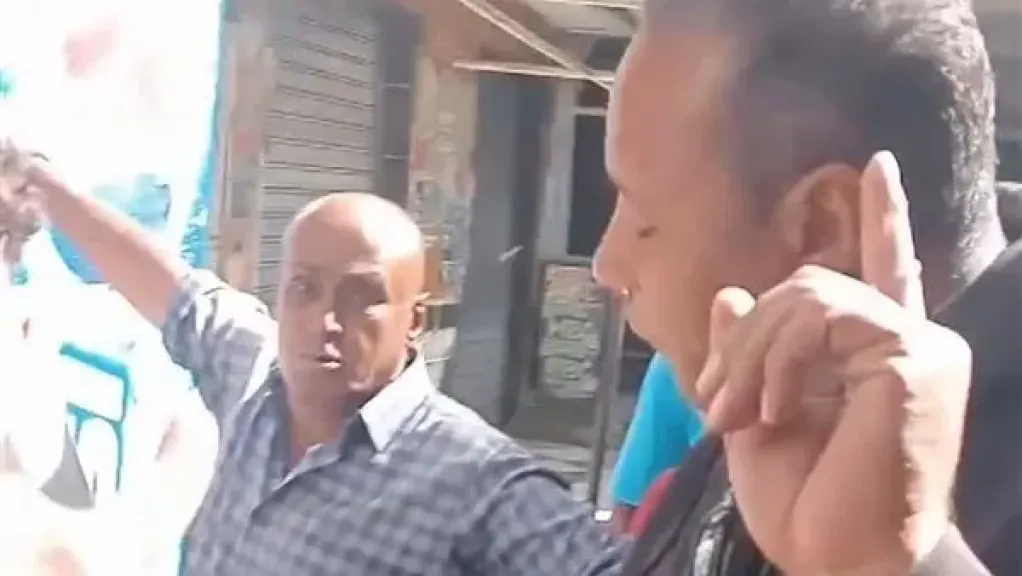 جانب من موظفي حي بولاق الدكرور أثناء الحملة