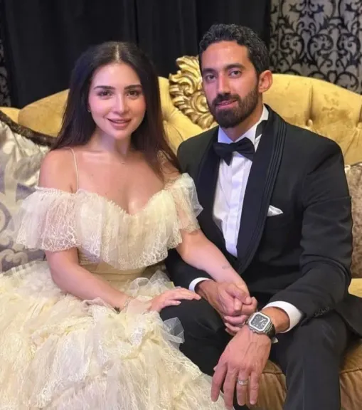عملتها فاليوم العالمي للسناجل..  مى عز الدين تعلن زواجها من مدرب اللياقة البدنية أحمد تيمور